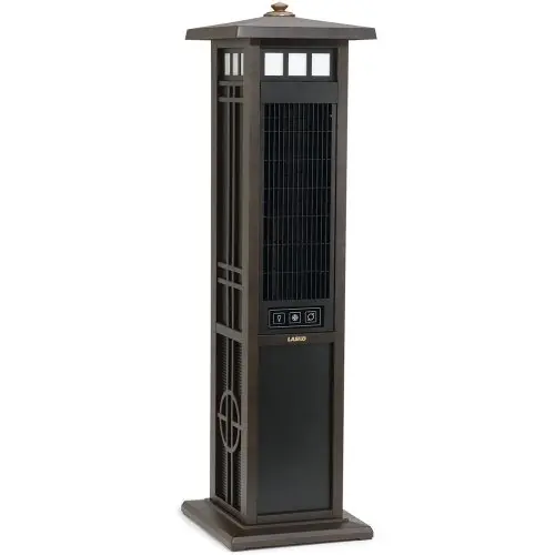Lasko brown elegant tower fan with accent lighting on a deck at night