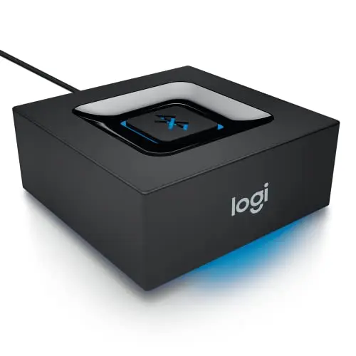 Logitech Bluetooth Audio Adapter with single button next to a speaker