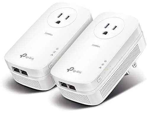 TP-Link TL-PA9020P AV2000 Powerline Ethernet adapter kit with two units and passthrough outlets.