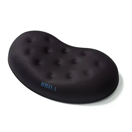 BRILA black memory foam mouse wrist rest with massage holes on a desk