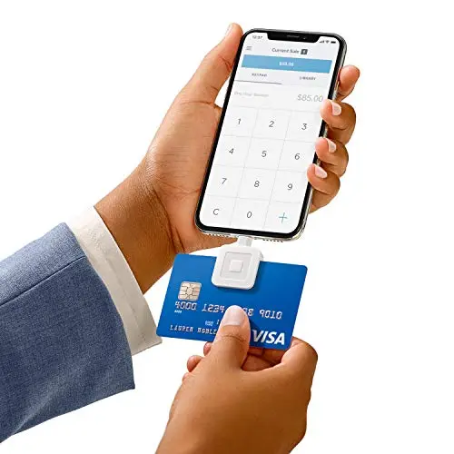 Square Magstripe Reader with Lightning connector plugged into an iPhone