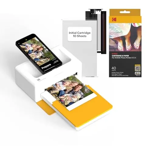 KODAK Dock Plus photo printer, a device that also serves as a phone charging dock.