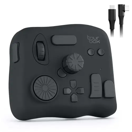 TourBox NEO editing controller with dials and buttons on a desk