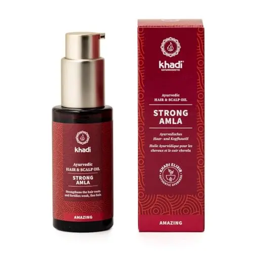 Khadi Strong Amla hair oil bottle with focus on amla fruit
