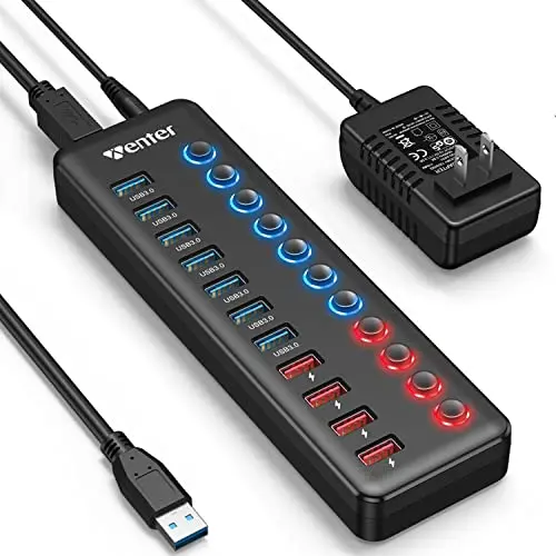 Wenter 11-port USB hub with LED lights next to studio monitors