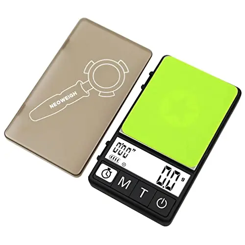 NEOWEIGH green mini digital scale positioned on an espresso machine drip tray.