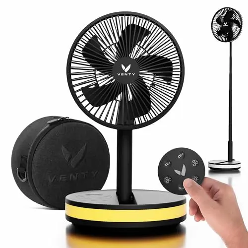 VENTY foldable portable fan oscillating on a table with remote control nearby
