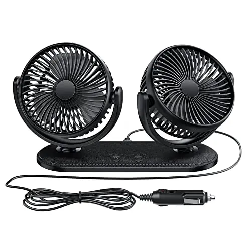 TriPole dual-head black 12V car fan with adjustable heads stuck to a dashboard.