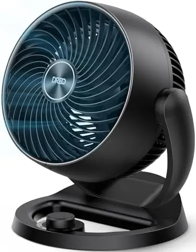 DREO compact black table fan with adjustable tilt on a desk
