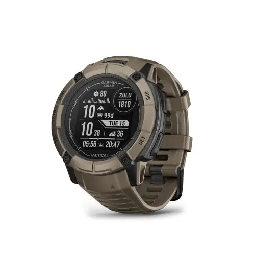 Garmin Instinct 2X Solar Tactical Edition smartwatch on a wrist in a wooded setting