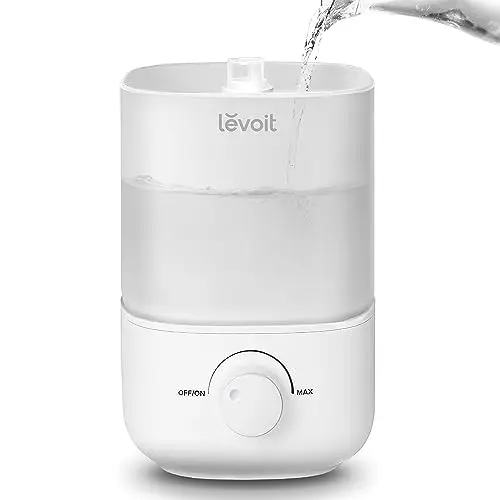 LEVOIT white round humidifier with a simple knob and top-fill opening.