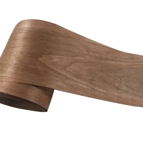 A long, dark wood veneer sheet with rich black walnut grain patterns, rolled up.