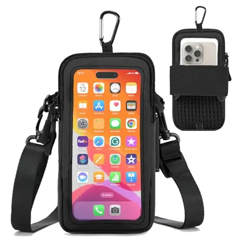 Prime Comfort clear panel phone pouch in black, showing a phone visible through the front window while worn crossbody.