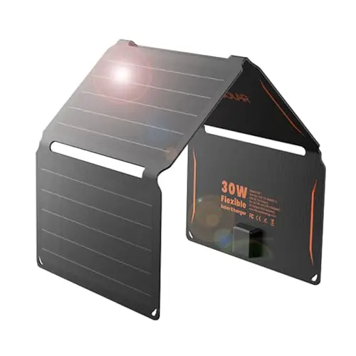 FlexSolar 30W black solar panel unfolded showing LED indicator and hanging from a tree branch
