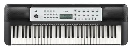 Yamaha YPT280 portable keyboard with music rest on a table