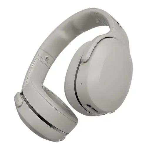 Skullcandy Crusher 540 Active wireless headphones in concrete color on a gym bench