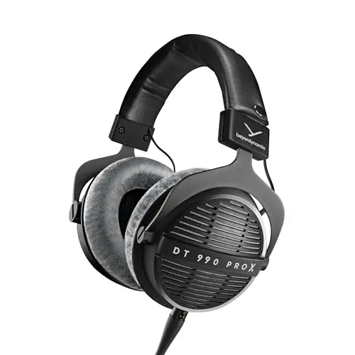 beyerdynamic DT 990 Pro X open-back studio headphones on a mixing desk