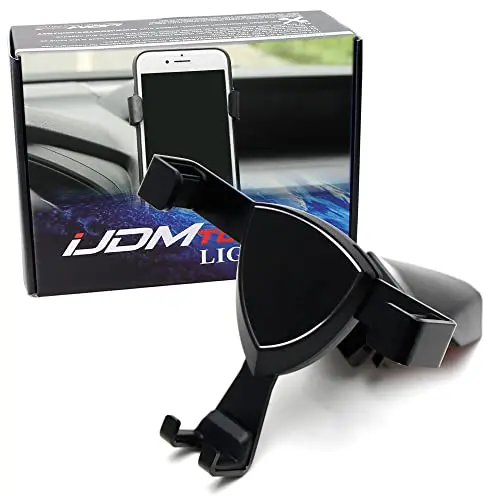 iJDMTOY Y-shape gravity phone holder clipped onto a Subaru Crosstrek center dashboard